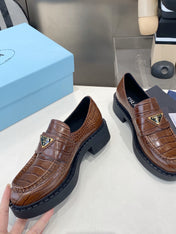 PRADA 26S LOAFERS IN DARK BROWN CROCODILE PRINT CALFSKIN