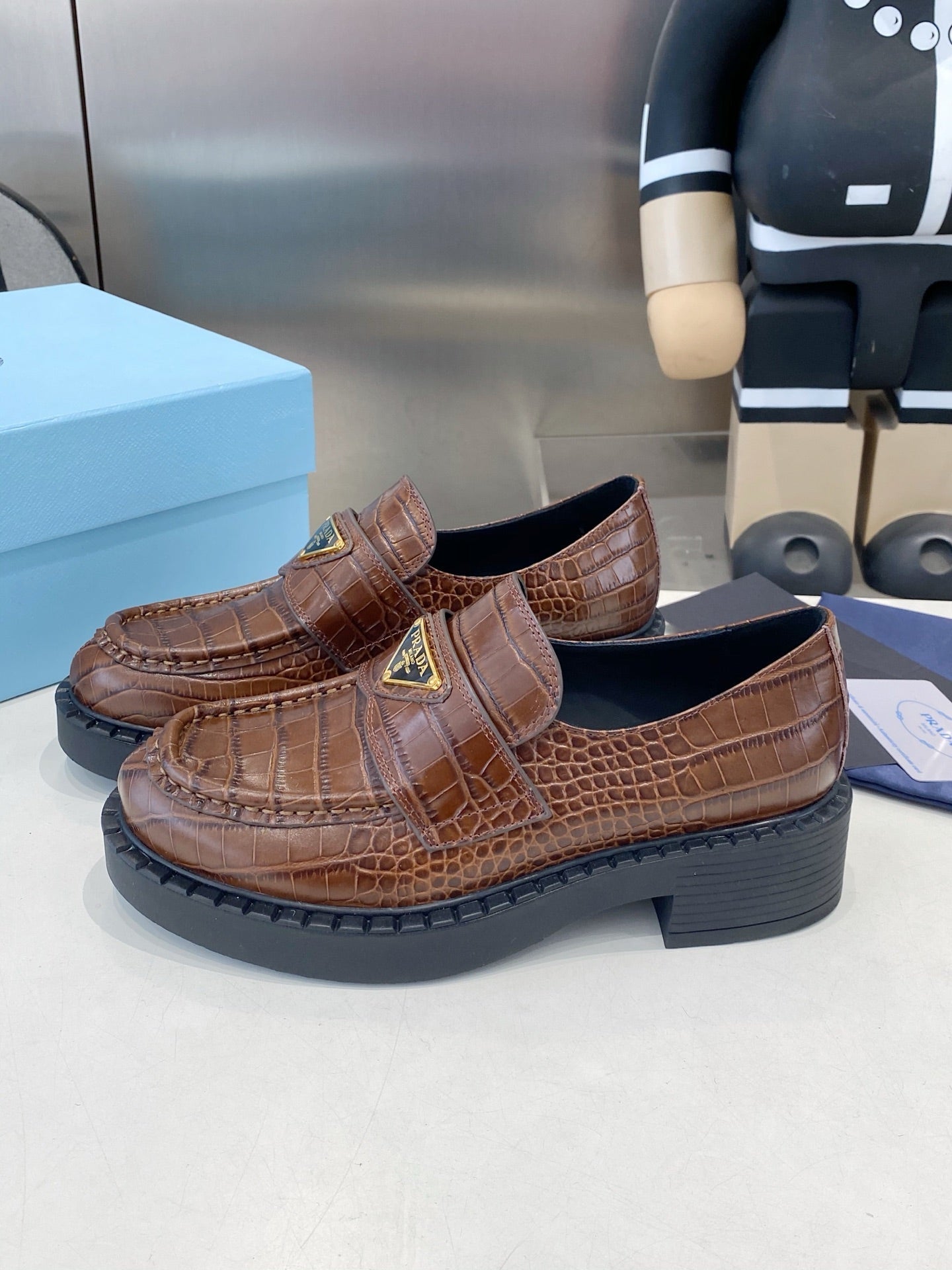PRADA 26S LOAFERS IN DARK BROWN CROCODILE PRINT CALFSKIN