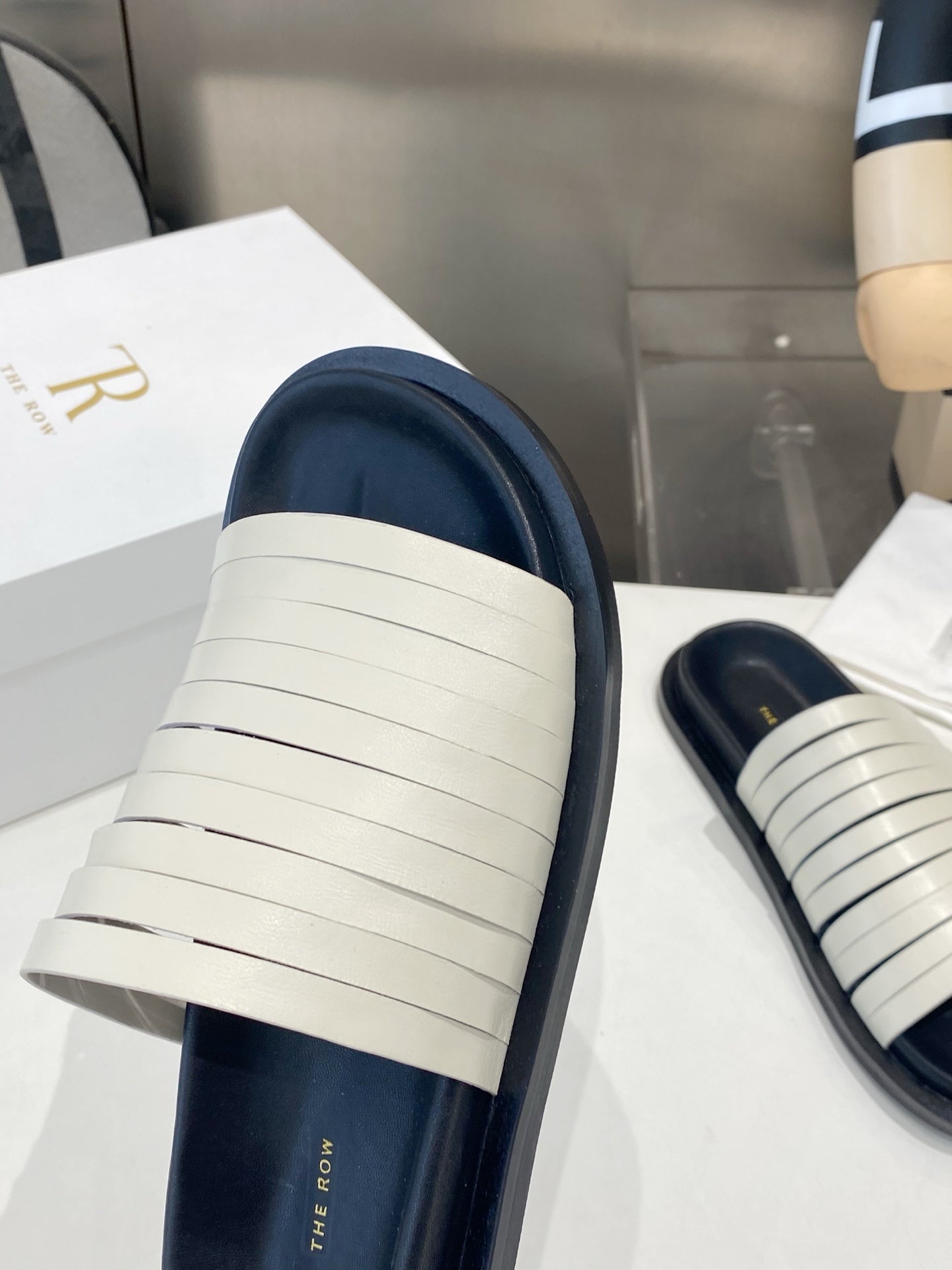 THE ROW 26S MULTI STRAP SLIDES IN WHITE CALFSKIN