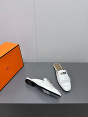 0Z MULE IN WHITE LAMBSKIN WITH FRINGE DETAIL
