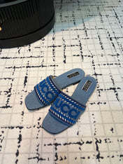 GG SLIDE SANDAL WITH GUCCI SCRIPT STONE DENIM