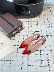 ALAIA FLAT SLINGBACK IN CHERRY RED PATENT CALFSKIN AND FILM
