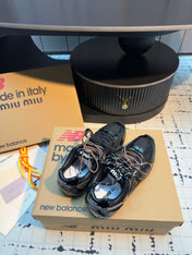 MIUMIU 26S RUNNING SNEAKERS IN BLACK CALFSKIN AND MESH RUBBER SOLE