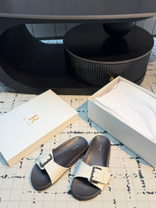 THE ROW 26S BUCKLE SLIDE SANDALS IN WHITE CALFSKIN