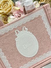 DIOR 26S  BOOK TOTE BAG 20 IN LIGHT PINK AND WHITE FABRIC
