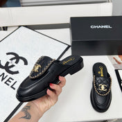CHANEL 25S MULES WITH CHAIN DETAIL IN BLACK CALFSKIN GOLD HARDWARE