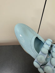 ALAIA SPHERE BALLET FLATS IN LIGHT BLUE LAMBSKIN