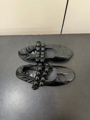ALAIA SPHERE BALLET FLATS IN BLACK LAMBSKIN