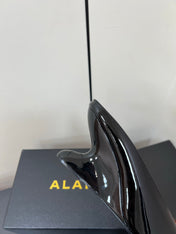 ALAIA WEDGE MULES 25S IN BLACK LAMBSKIN