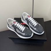 PRADA 26S SNEAKERS IN GRAY PATENT CALFSKIN AND WHITE MESH