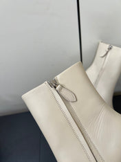 ALAIA 26S SQUARE-TOE BOOTS IN WHITE CALFSKIN