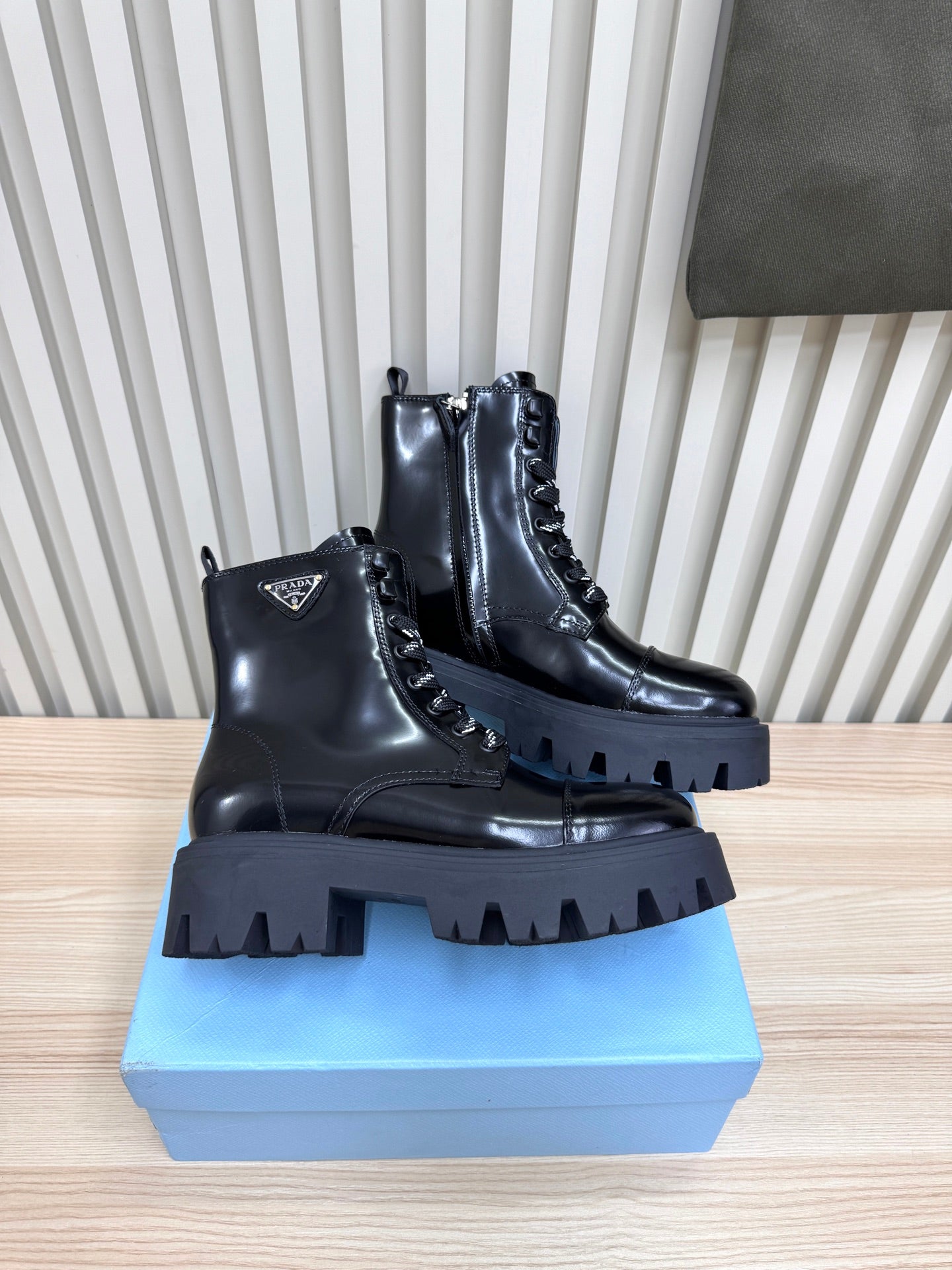PRADA 25S MONOLITH BOOTS IN BLACK GLOSSY CALFSKIN