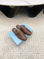 TASSEL MULES IN RUSSET BROWN LAMBSKIN
