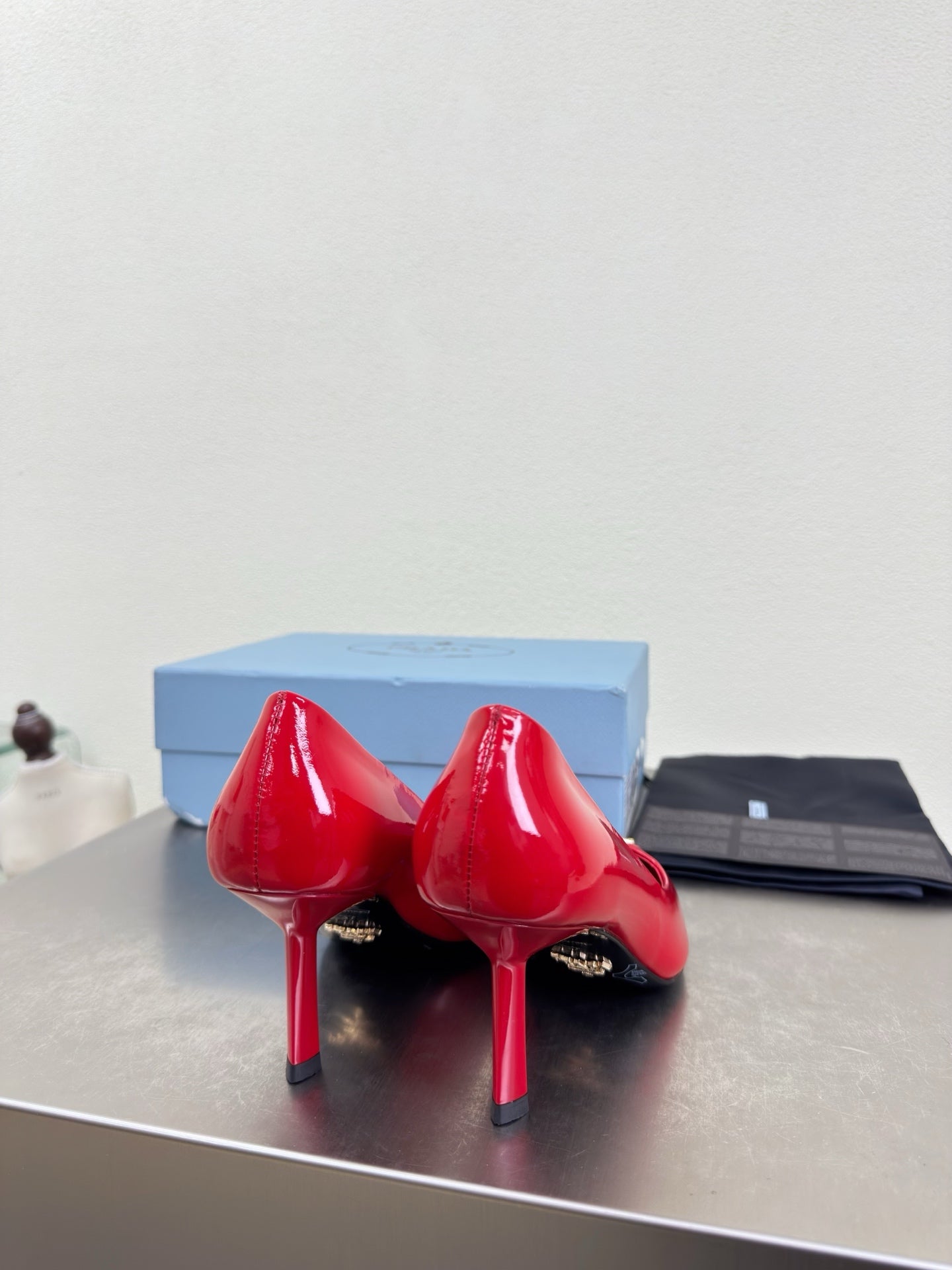 PRADA 26S POINTED TOE PUMPS 75MM IN RED PATENT CALFSKIN