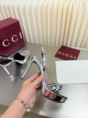 GUCCI 26S SLINGBACK PUMP 105 MM IN SILVER CALFSKIN