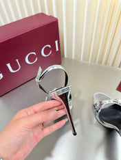 GUCCI 26S SLINGBACK PUMP 105 MM IN SILVER CALFSKIN