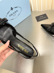 PRADA 26S POINTED-TOE SLINGBACK PUMPS IN BLACK PATENT CALFSKIN WITH BOW