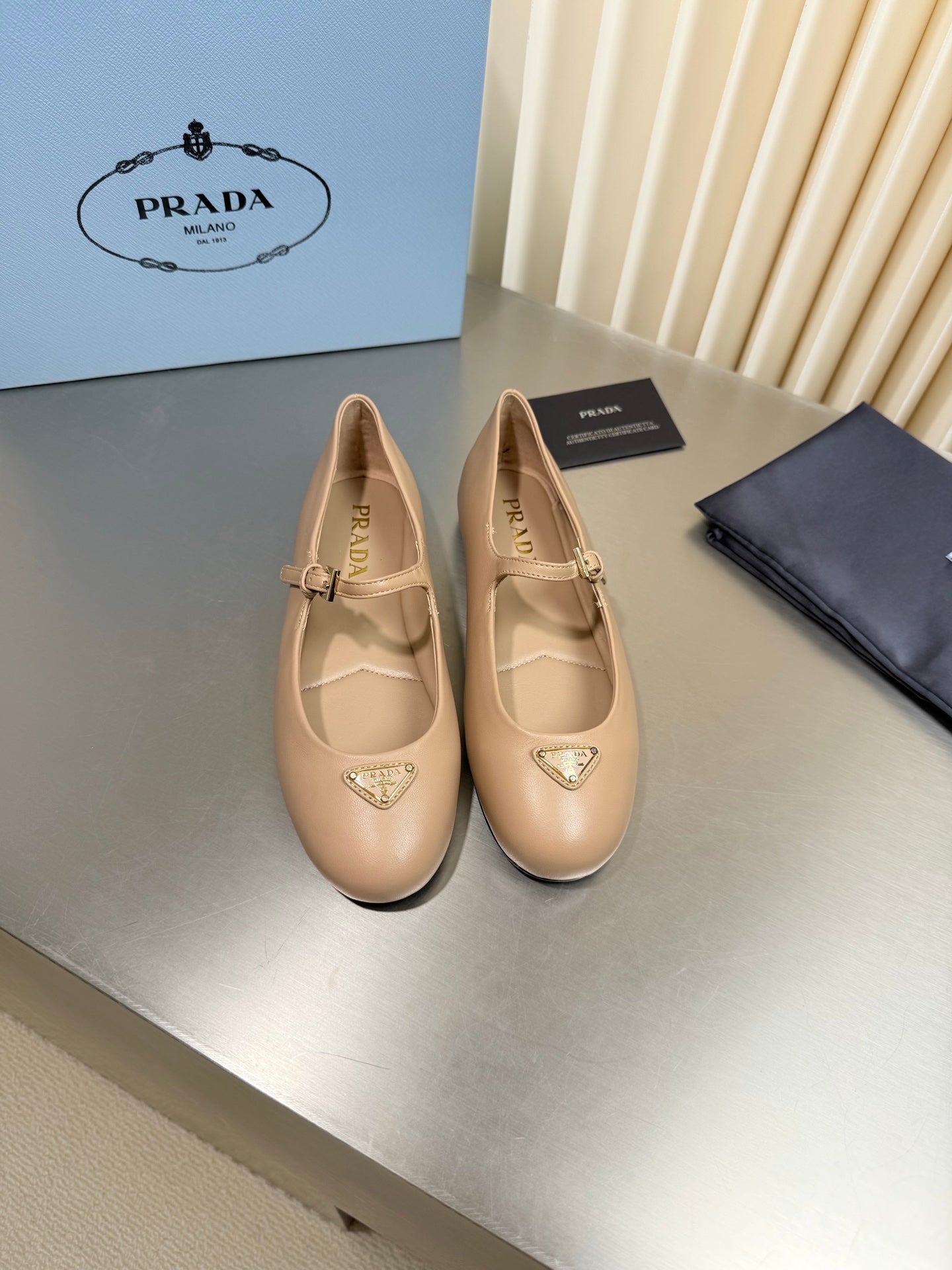 PRADA 26S MARY JANE FLATS IN BEIGE CALFSKIN
