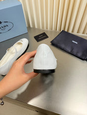 PRADA 26S MARY JANE FLATS IN WHITE CALFSKIN
