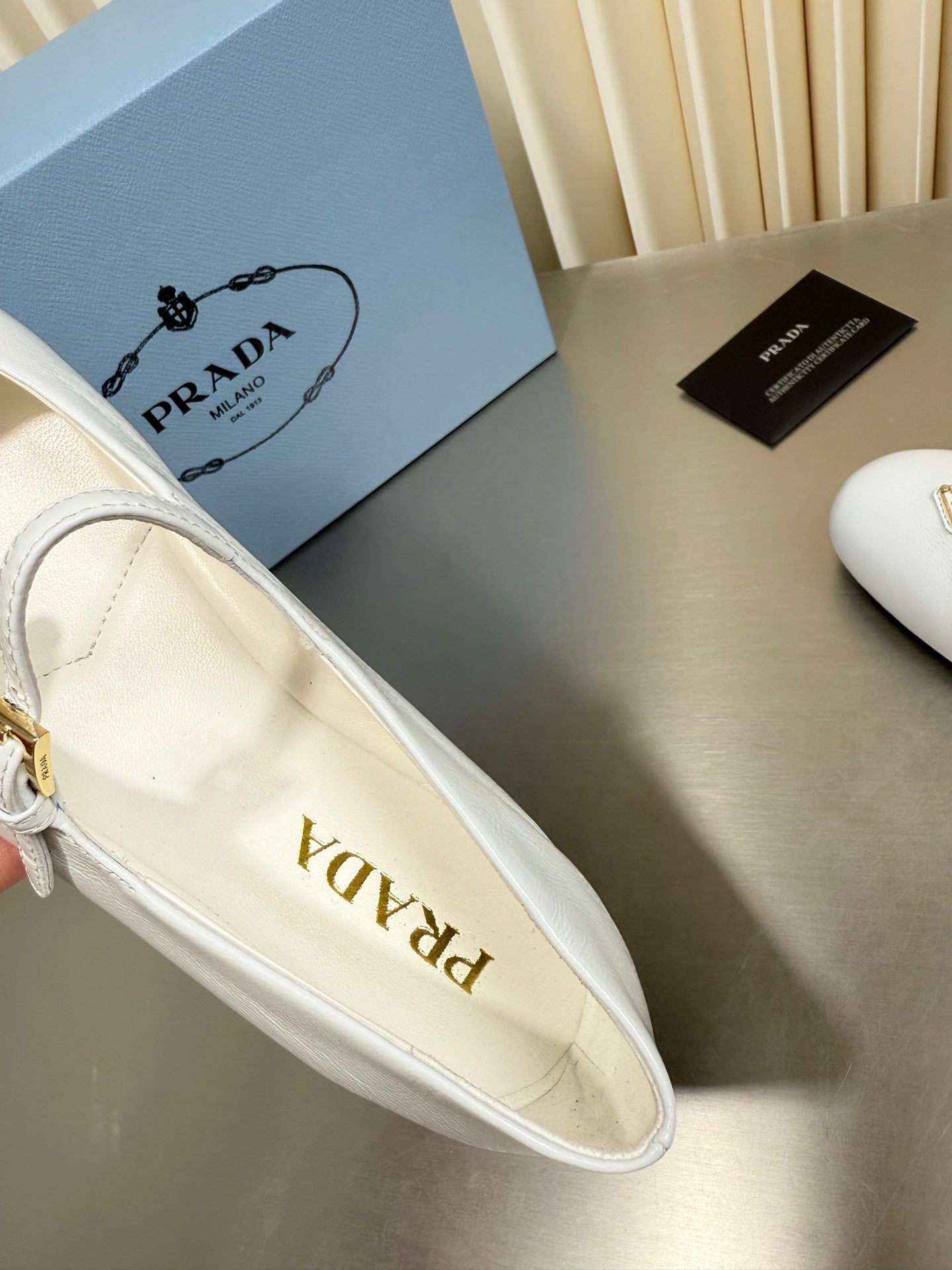 PRADA 26S MARY JANE FLATS IN WHITE CALFSKIN