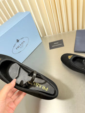 PRADA 26S MARY JANE FLATS IN BLACK SUEDE