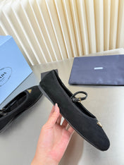 PRADA 26S MARY JANE FLATS IN BLACK SUEDE