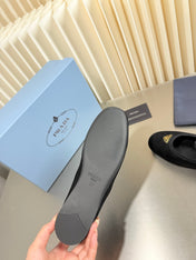 PRADA 26S MARY JANE FLATS IN BLACK SUEDE