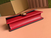 INTERLOCKING WOC 20 IN RED PEBBLED GRAINY CALFSKIN GOLD HARDWARE