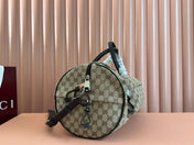 GG SMALL DUFFLE BAG 42 IN BEIGE AND DARK BROWN GG CANVAS