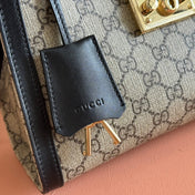 GUCCI 26S PADLOCK TOP HANDLE BAG 25 IN DARK BEIGE AND BLACK CALFSKIN