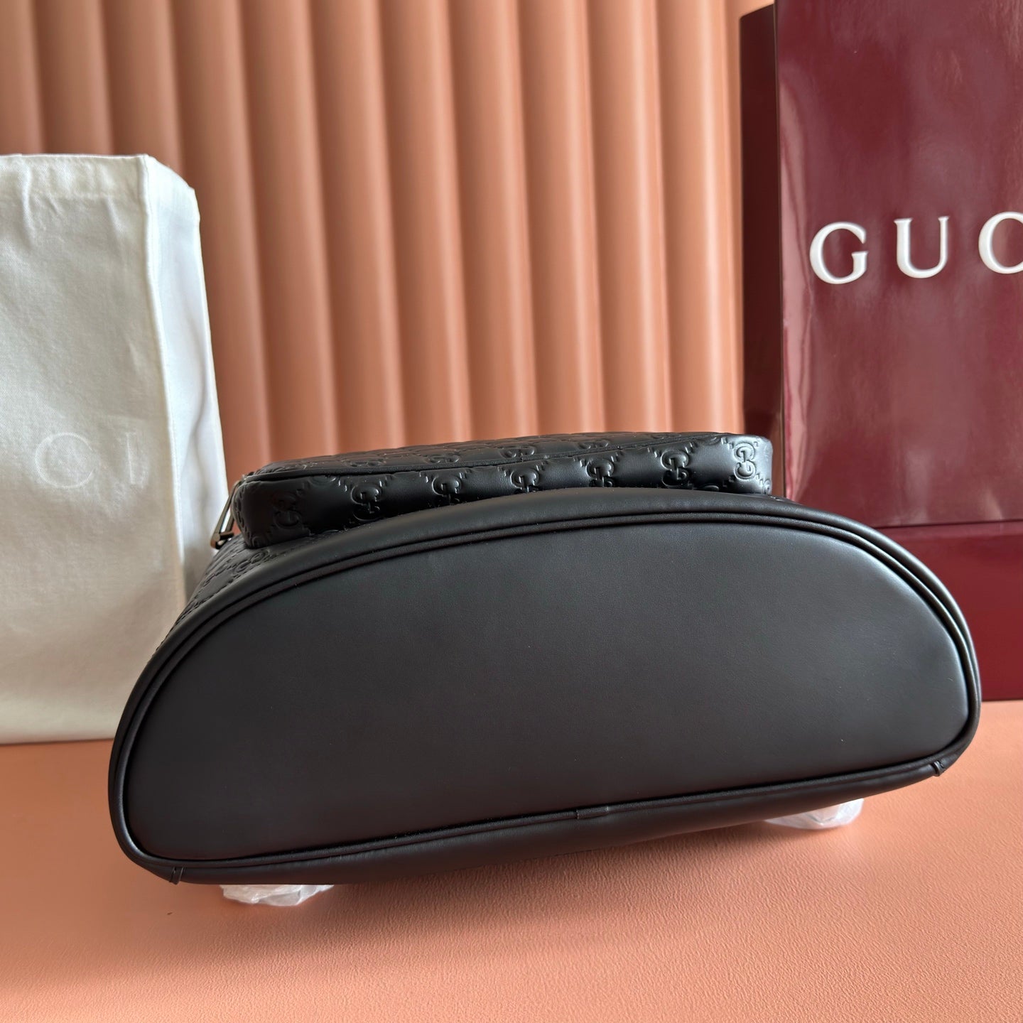 GUCCI 26S GG EMBLEM BACKPACK 44 IN BLACK EMBOSSED CALFSKIN