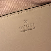 GUCCI 26S GG EMBLEM BUCKET BAG 22 IN LIGHT PINK COATED FABRIC