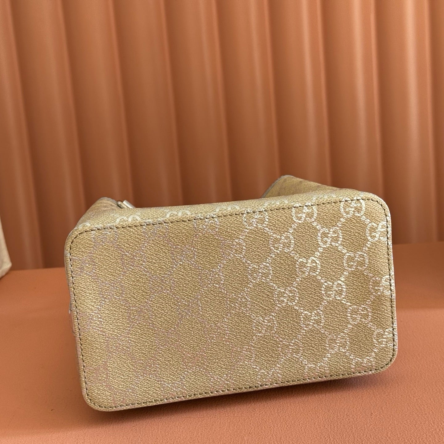 GUCCI 26S GG EMBLEM BUCKET BAG 19 IN BEIGE AND SILVER CANVAS