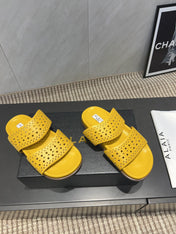 ALAIA CHUNKY TWO-STRAP SLIDES 25S IN YELLOW CALFSKIN