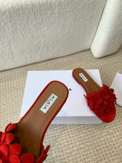 ALAIA FLAT MULE IN CHERRY RED SUEDE