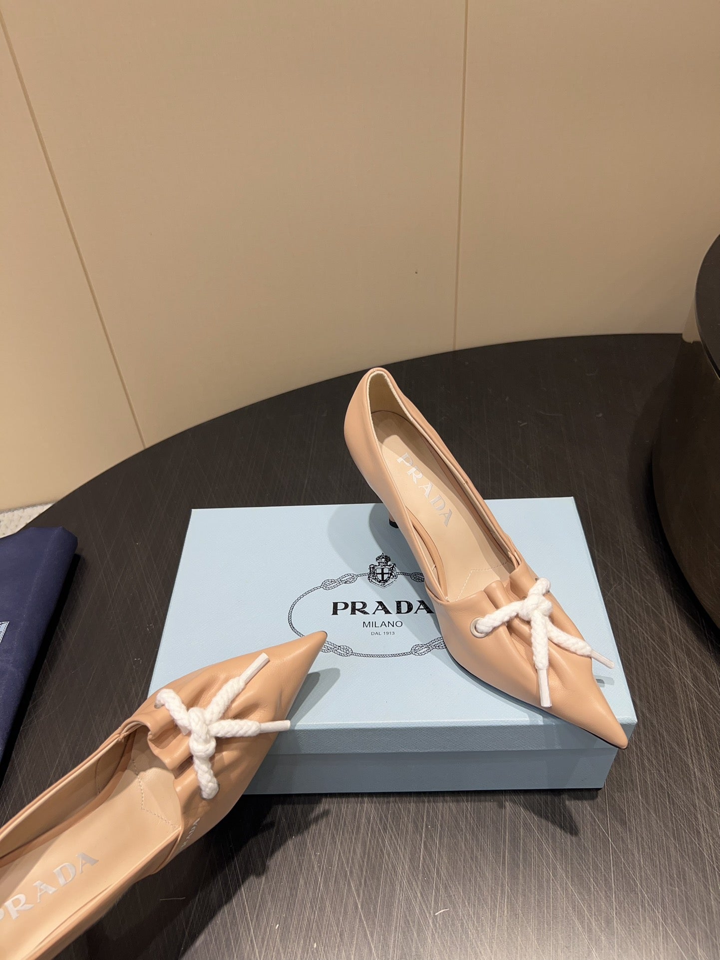 PRADA 25S POINTED TOE HIGH HEELS 85MM IN BEIGE LAMBSKIN WITH TIE UP DESIGN