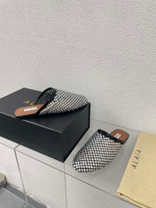 ALAIA FLAT MULES IN STRASS BLACK LAMBSKIN WITH RHINSTONES
