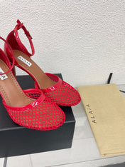 ALAIA HIGH FISHNET 9 CM PUMPS IN CHERRY RED MESH