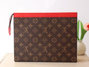 LV 25S POCHETTE VOYAGE 26 IN SARI RED MONOGRAM MACASSAR COATED CANVAS