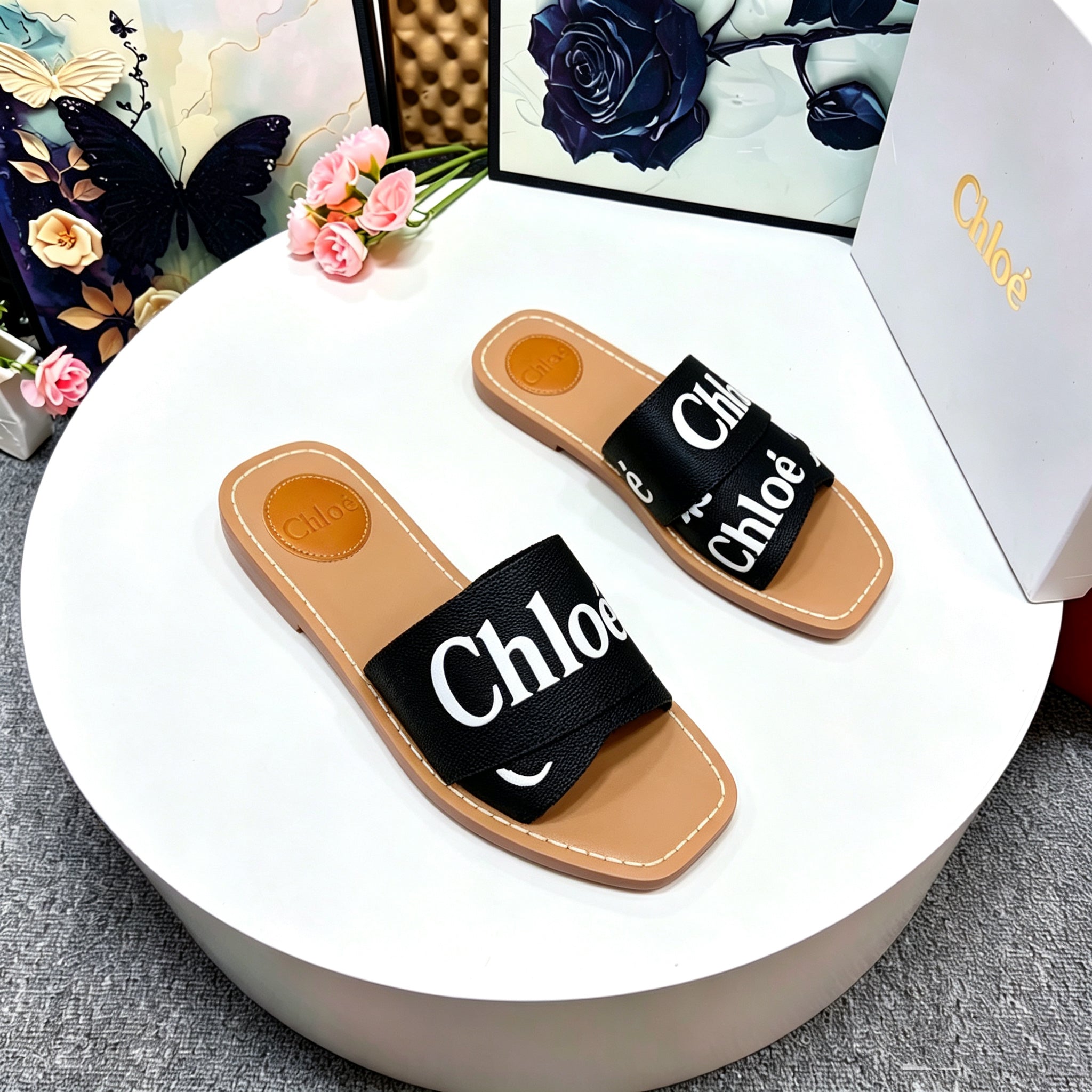 CHLOE 26S CRISSCROSS SLIDES IN BLACK CANVAS