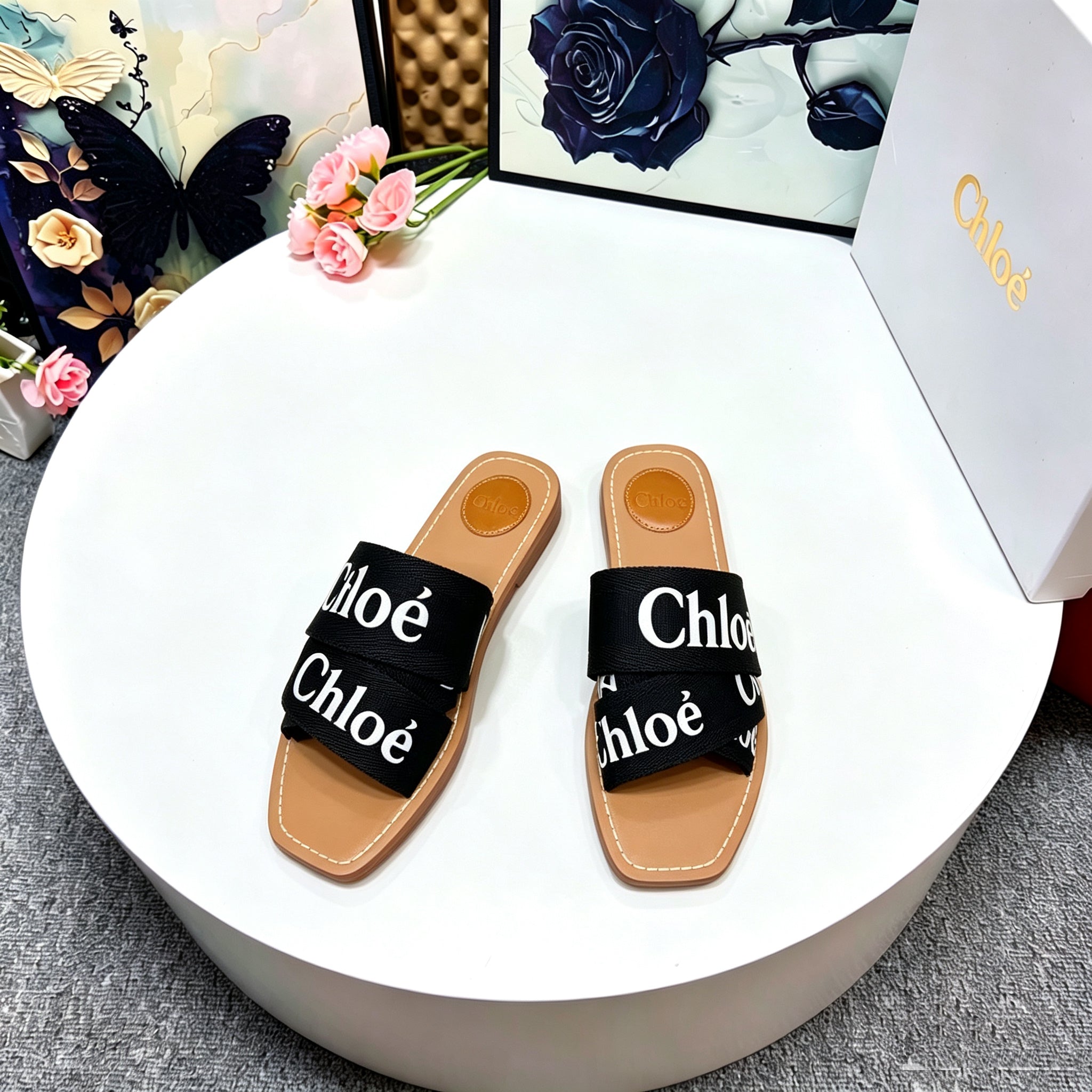 CHLOE 26S CRISSCROSS SLIDES IN BLACK CANVAS