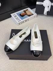 FLAT MARY JANE PUMPS IN WHITE MIX BLACK LAMBSKIN