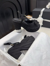 HIGH 12 CM PLATFORM SANDALS IN BLACK SUEDE