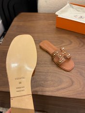 HM 26S ORAN STUDDED SANDALS IN BROWN CALFSKIN