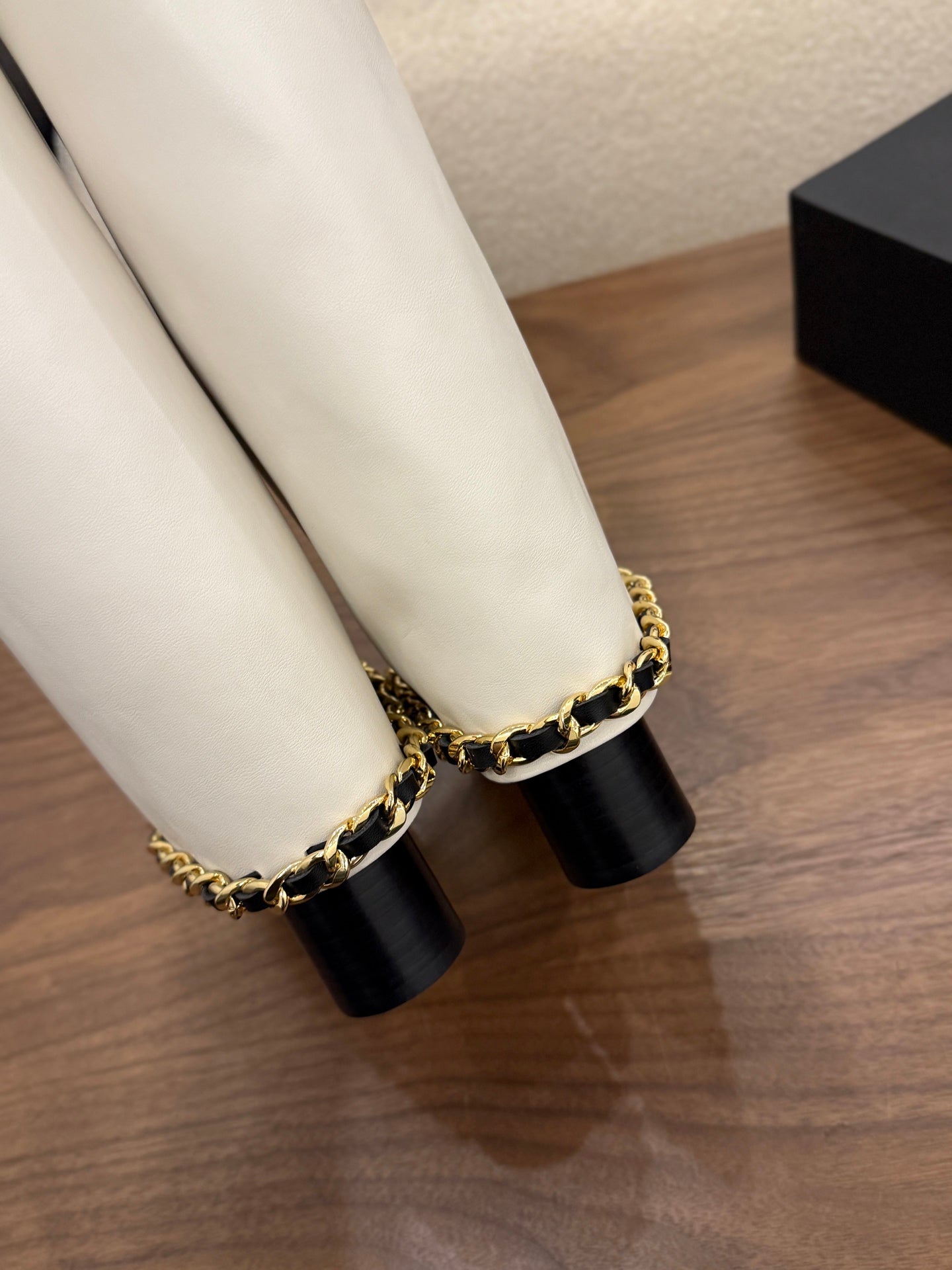 CHANEL 26S TALL BOOTS 60 MM IN WHITE CALFSKIN TALL BOOTS WITH GOLD TONE CHAIN DETAIL