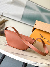 LOW KEY BUMBAG 28 IN SPANISH ORANGE CALFSKIN GOLD BUCKLE