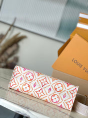 ONTHEGO EAST WEST 25 IN CORAL MONOGRAM TILES CANVAS