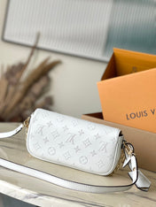 WALLET ON CHAIN IVY 23 IN WHITE MONOGRAM PERFORATED CALFSKIN GOLD HARDWARE