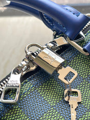 KEEPALL BANDOULIÈRE 45 IN BLUE GREEN DAMIER HERITAGE COATED CANVAS