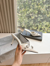 CRYSTAL BUCKLE WHITE CALFSKIN HEELED MULES